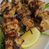 Two Skewers, Tabouli Salad, Chips, Tzatziki, Pita